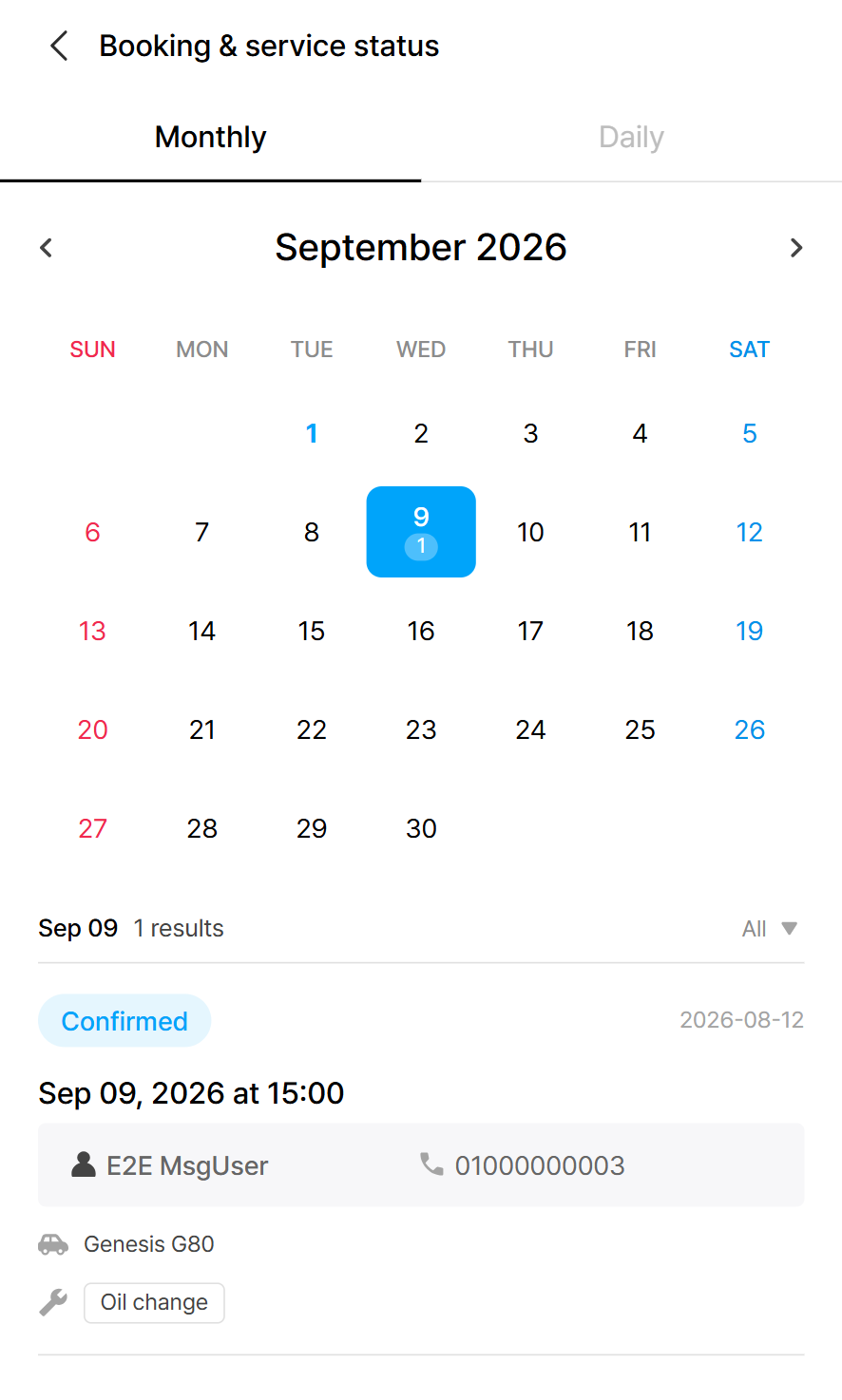 Monthly calendar view of bookings with a selected date showing a confirmed appointment